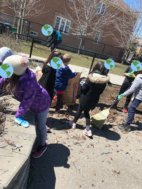 Picture of children cleaning up the environment
